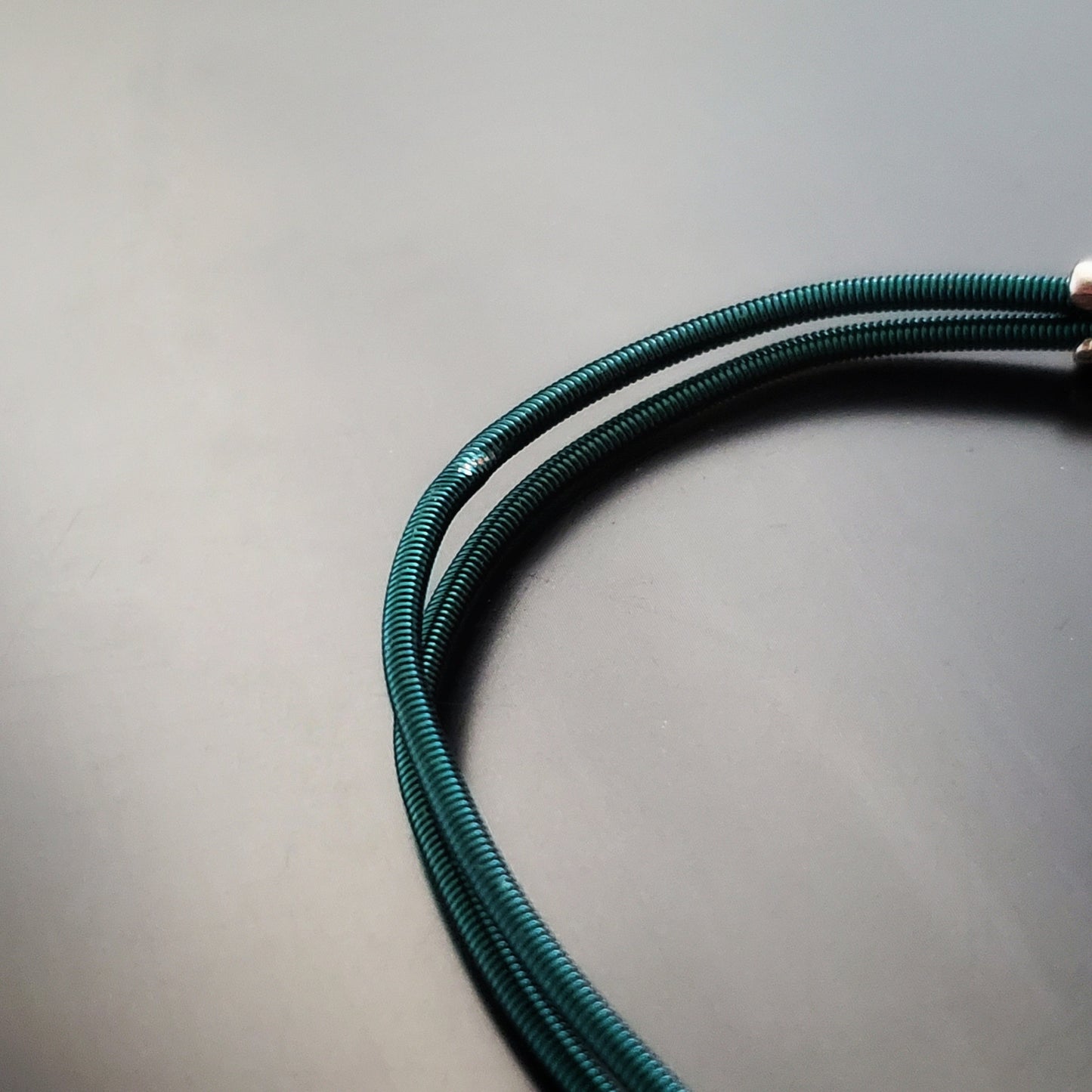 Green Harp String Clasp Style Bracelet