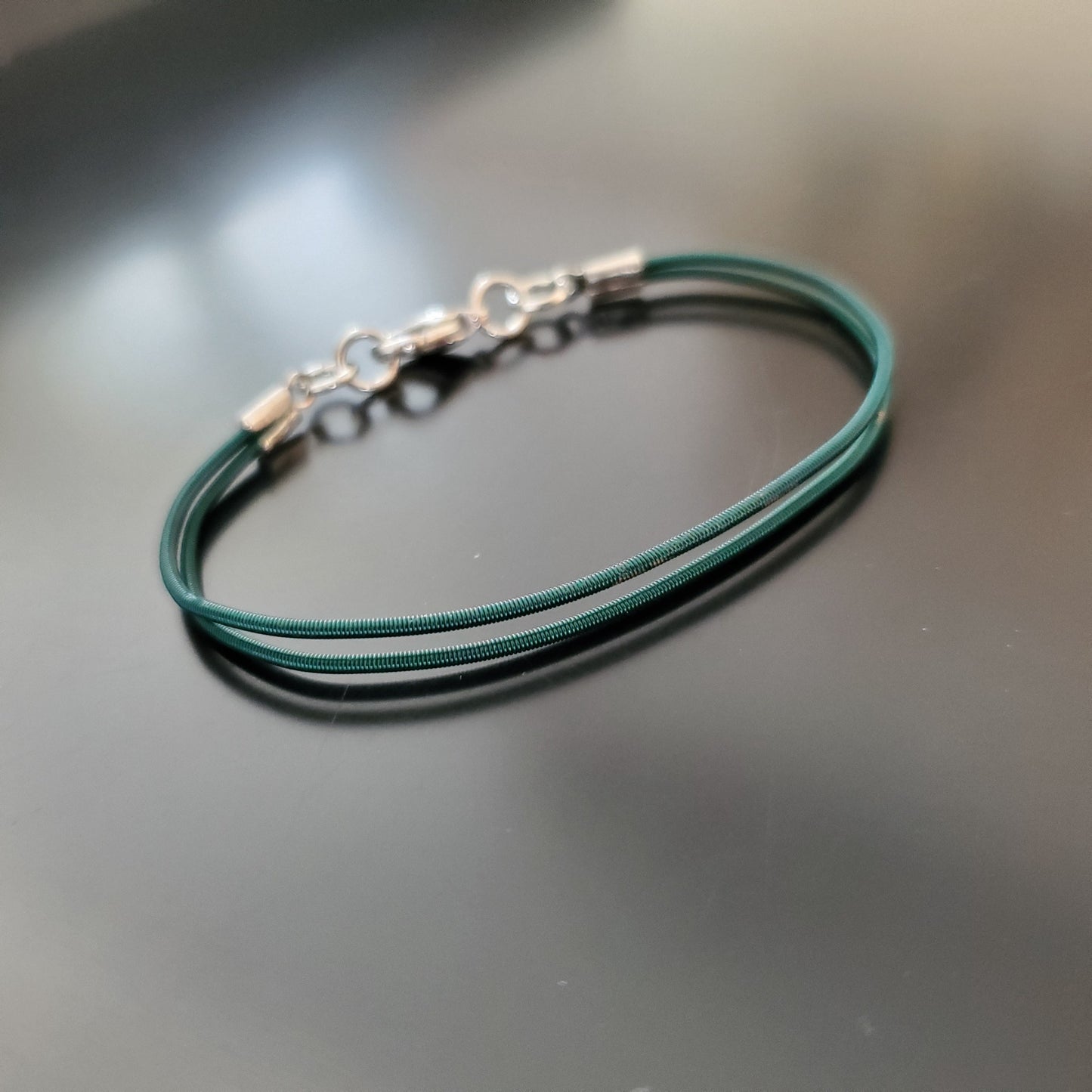 Green Harp String Clasp Style Bracelet