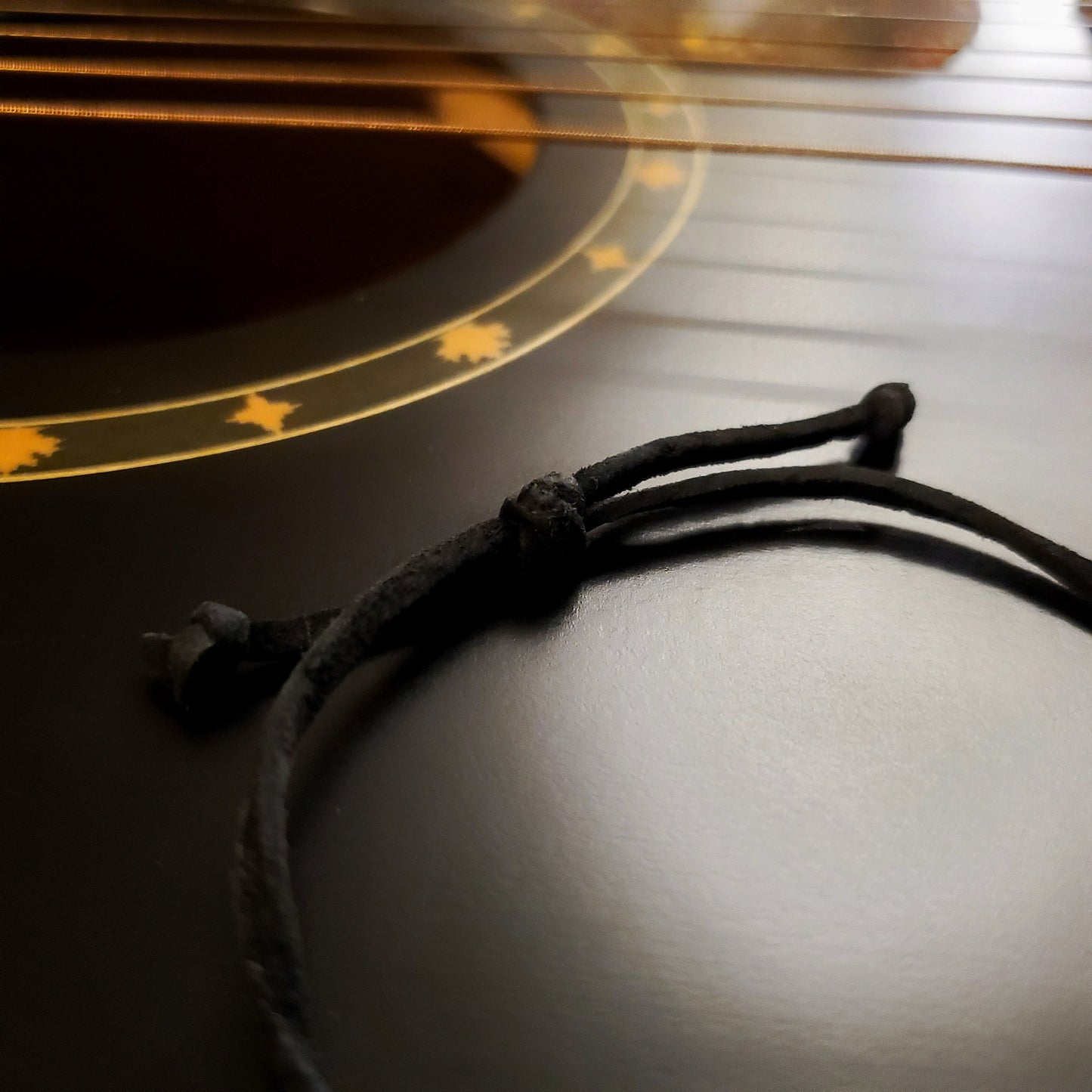 Sliding Knot Adjustable Guitar String Ballends and Suede Unisex Bracelet