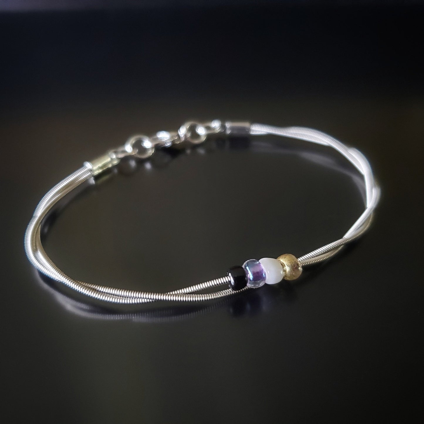 Bracelet de fierté non-binaire en corde de guitare