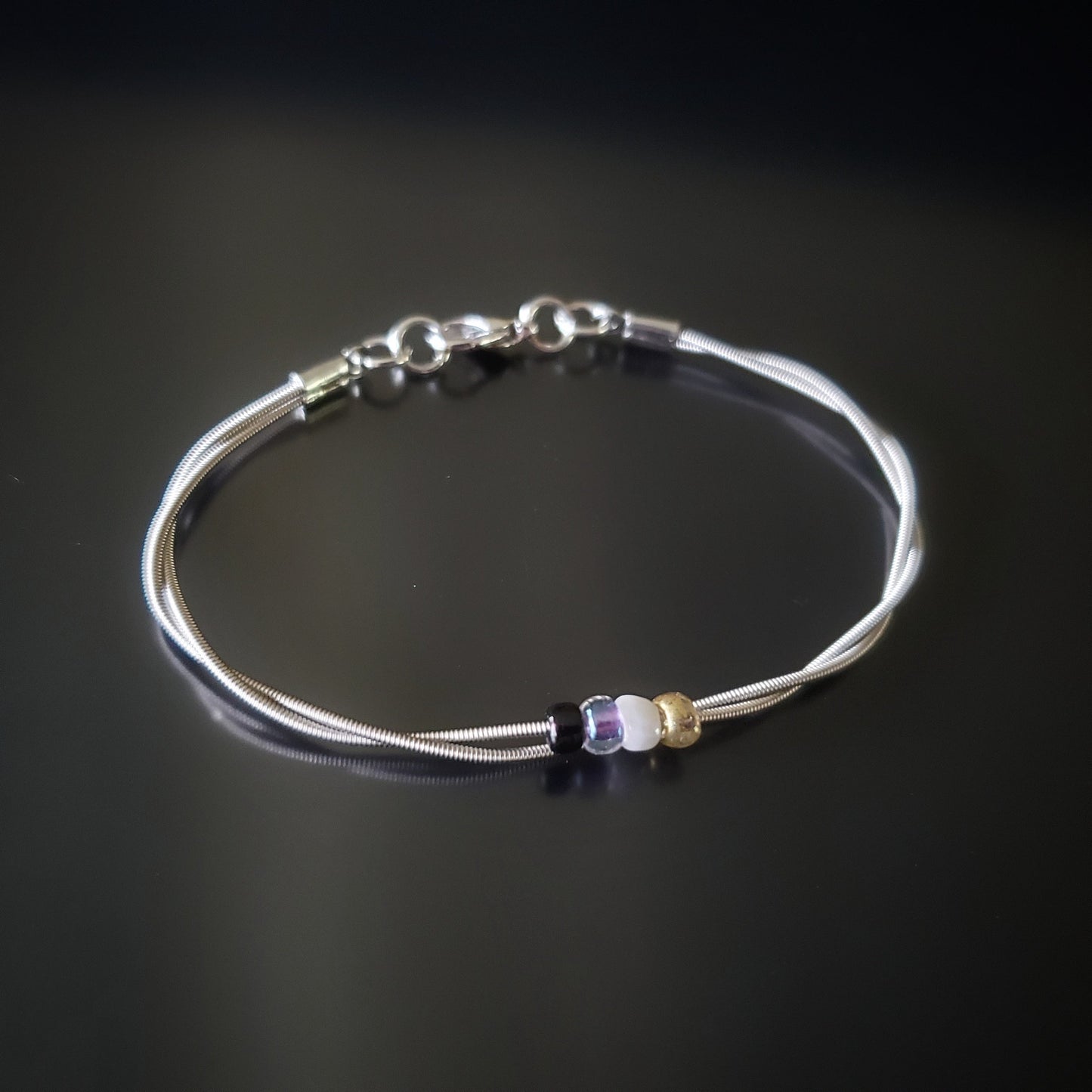Bracelet de fierté non-binaire en corde de guitare