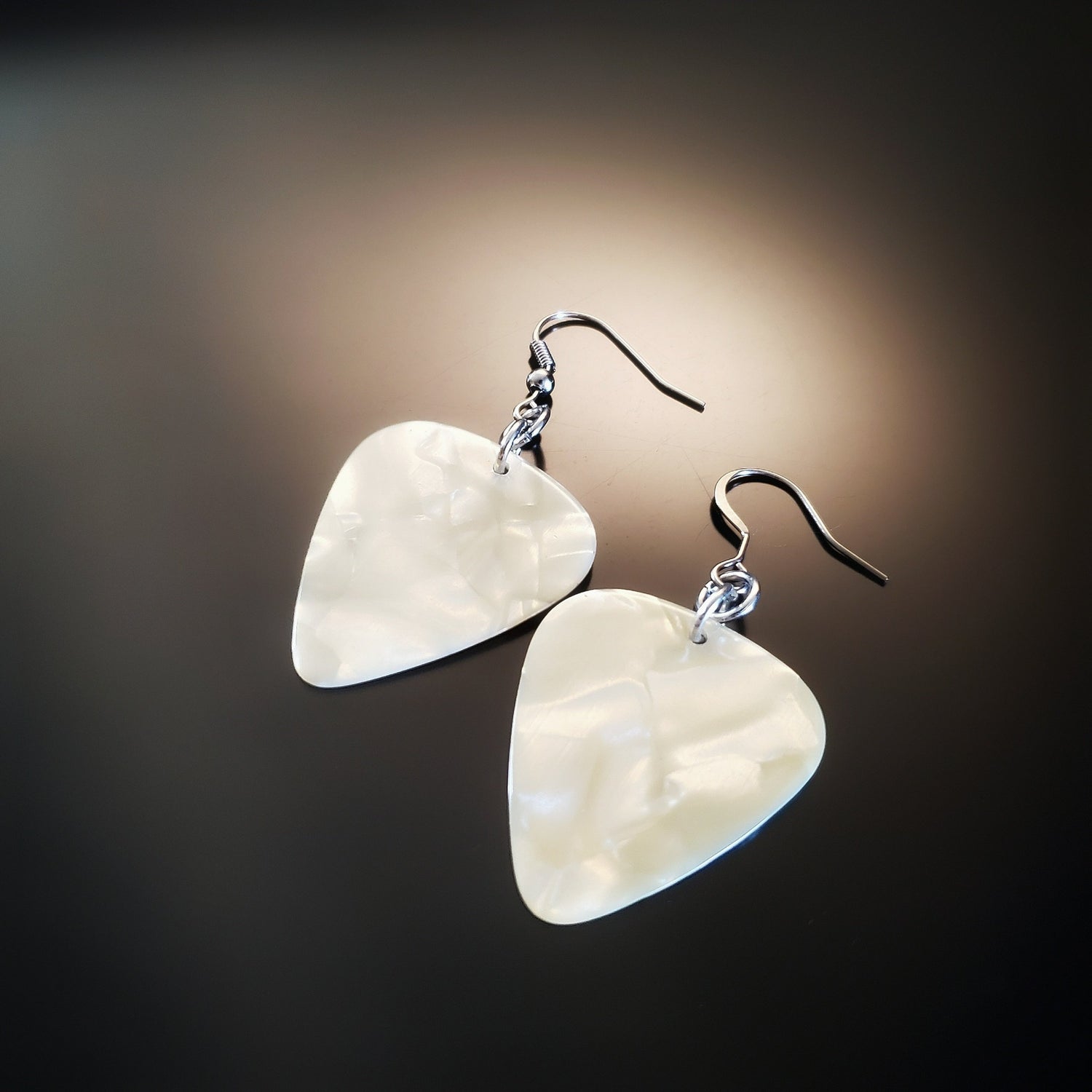 earrings made from pearly white guitar picks