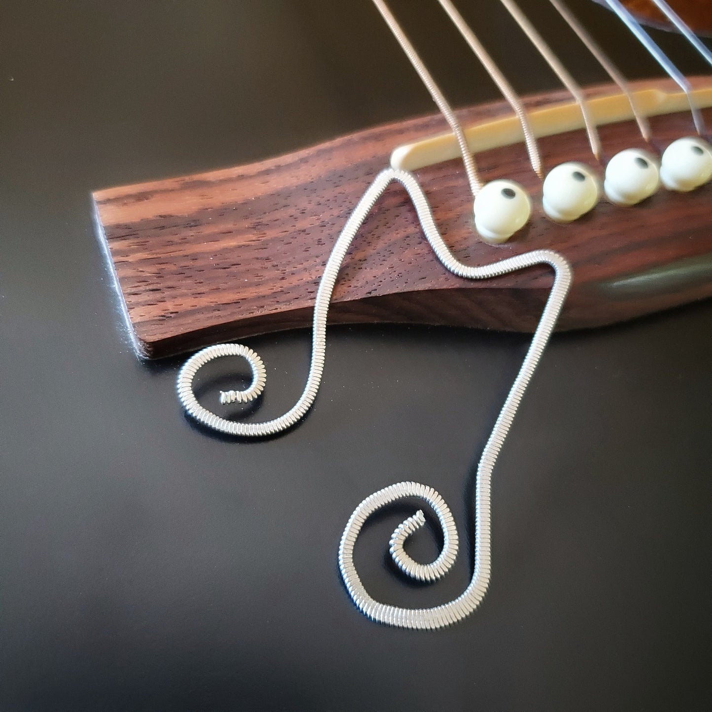 Music Note Hammered Guitar String Bookmark