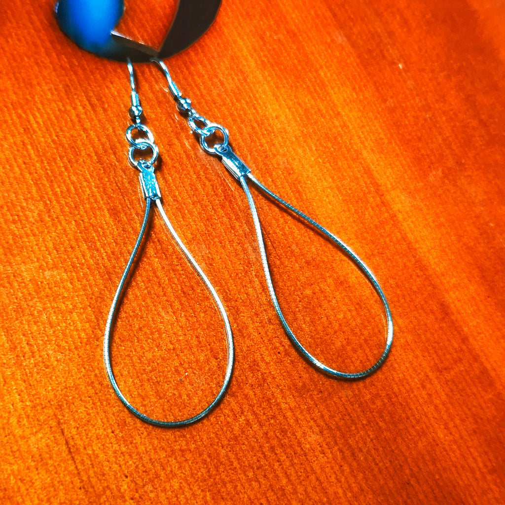 Cello String Earrings on Cello Close Up