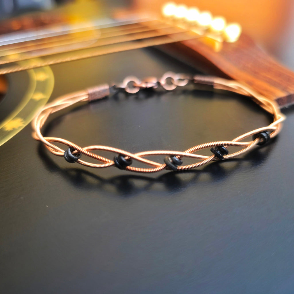 Close-up Braided Bronze Guitar String Black Ballend Unisex Bracelet