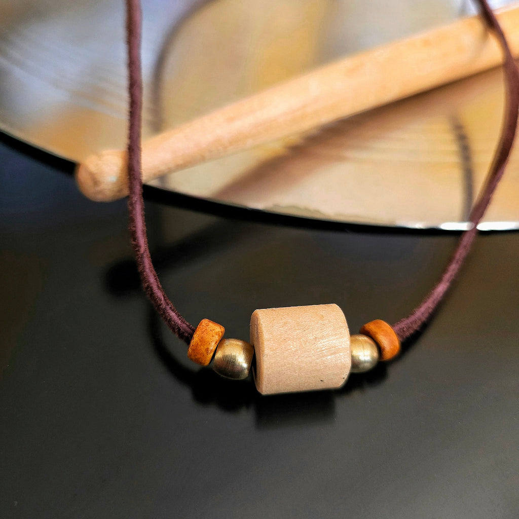 Upcycled Drumstick and Brown Suede Necklace With Smooth Beads Drumstick and Cymbal in Background