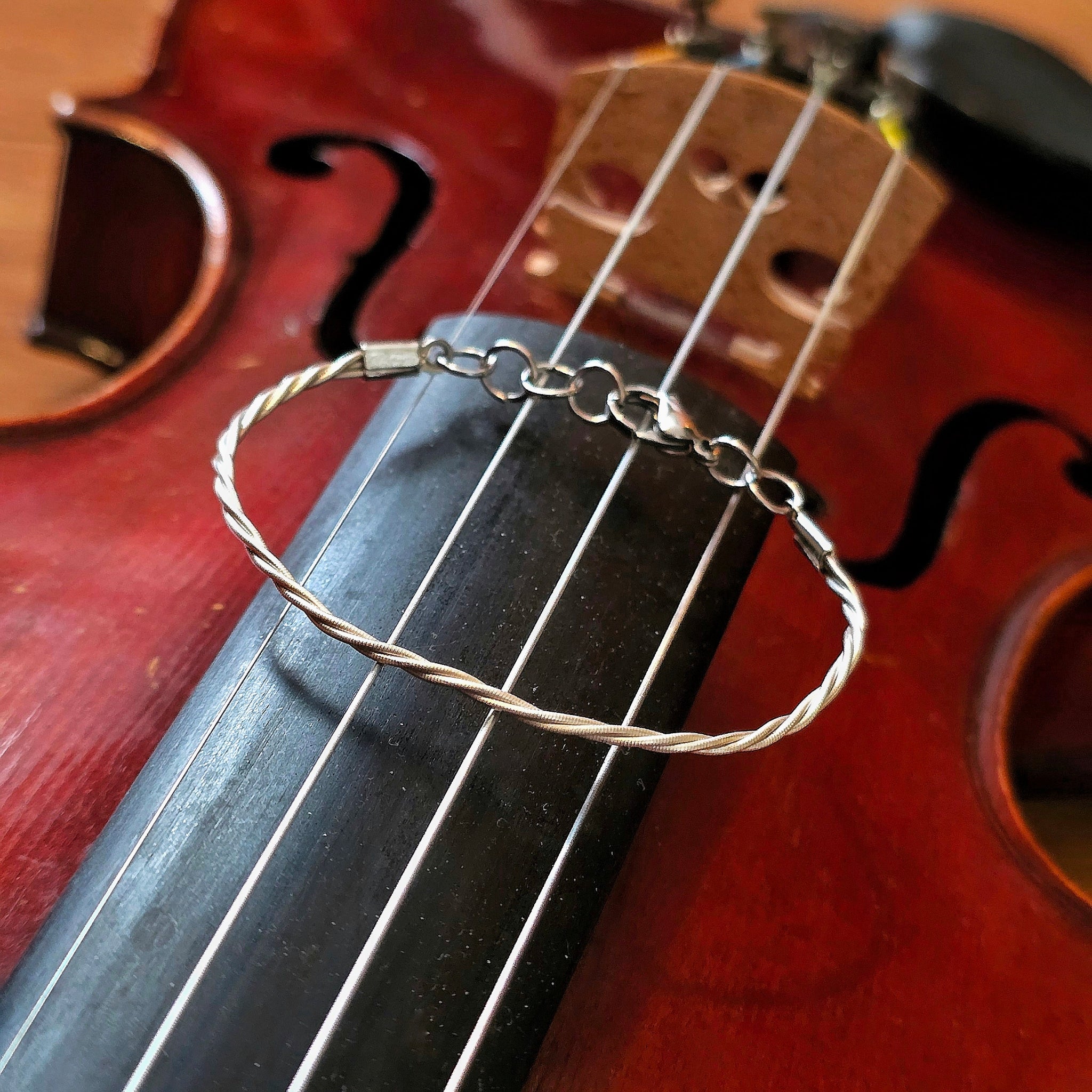 Violin String Bracelet on Violin Fingerboard