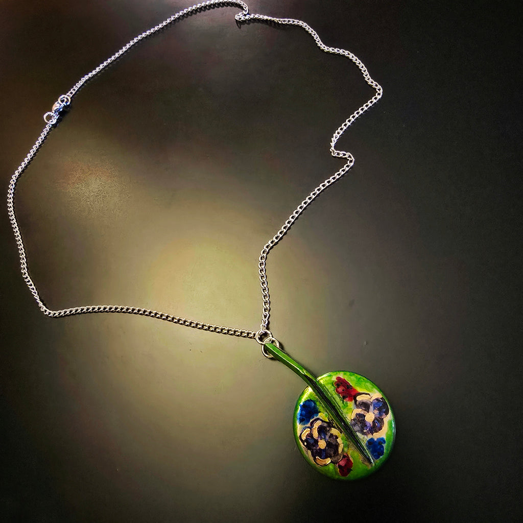 Collier de clé de saxophone avec fleurs