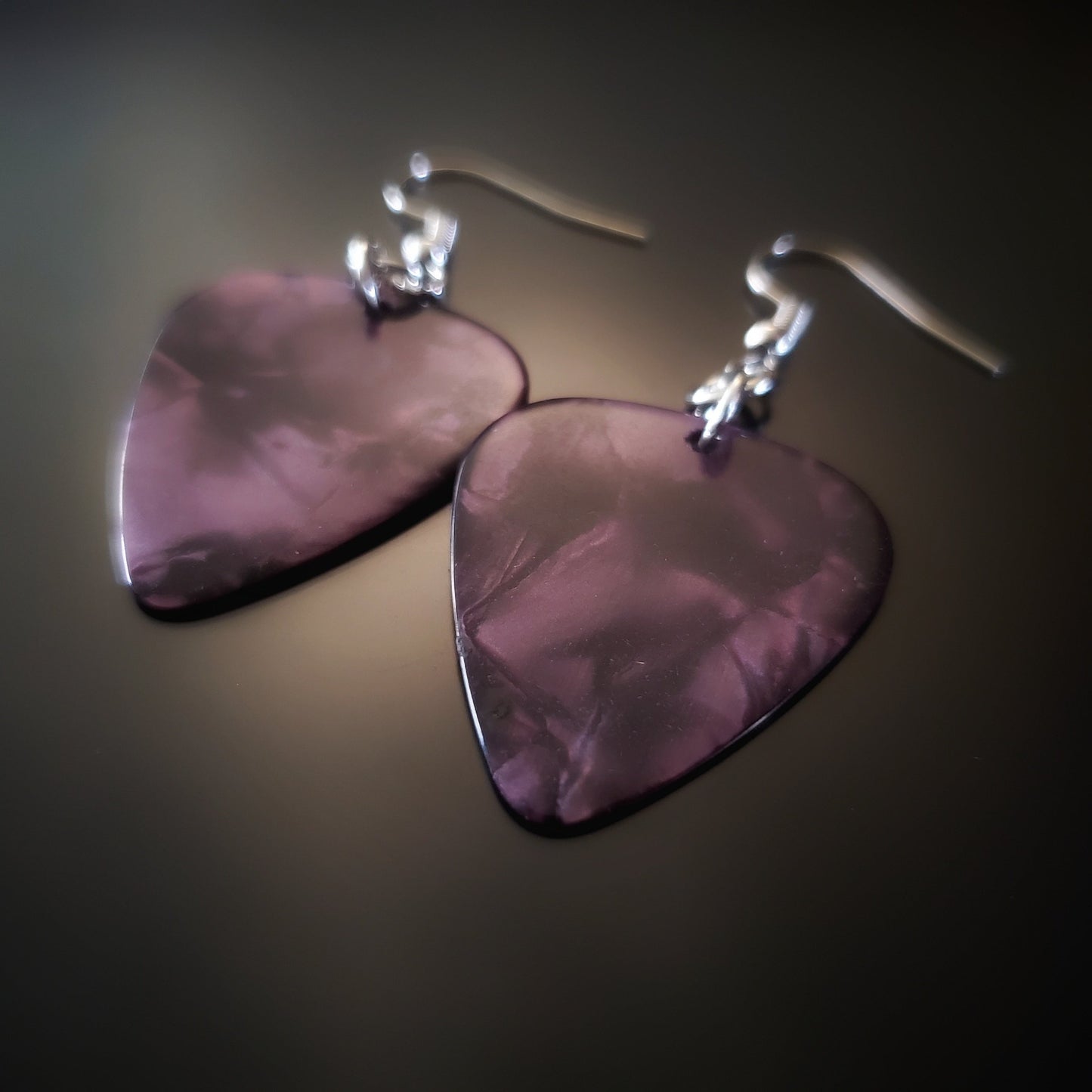 earrings made from purple guitar picks