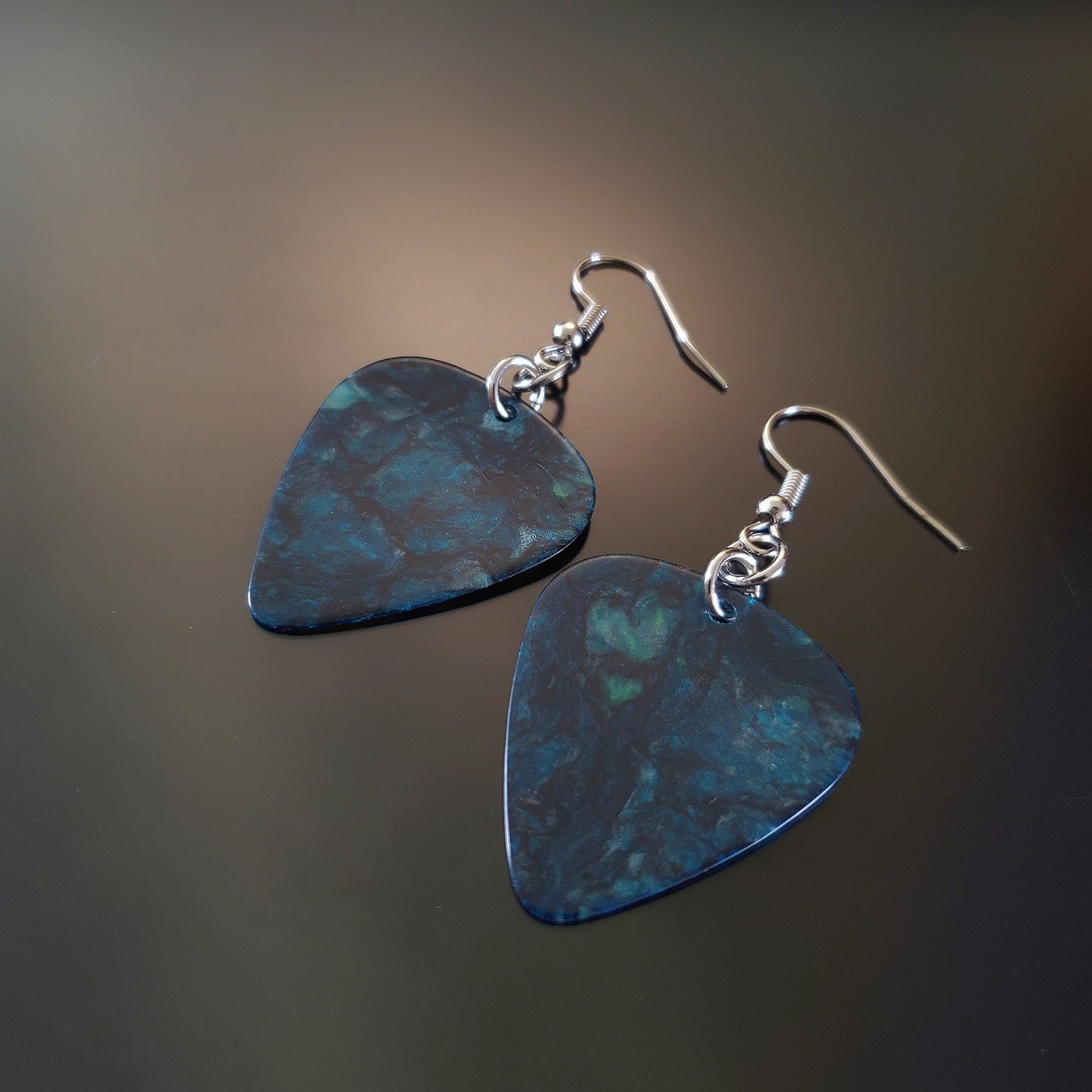 earrings made from teal guitar picks